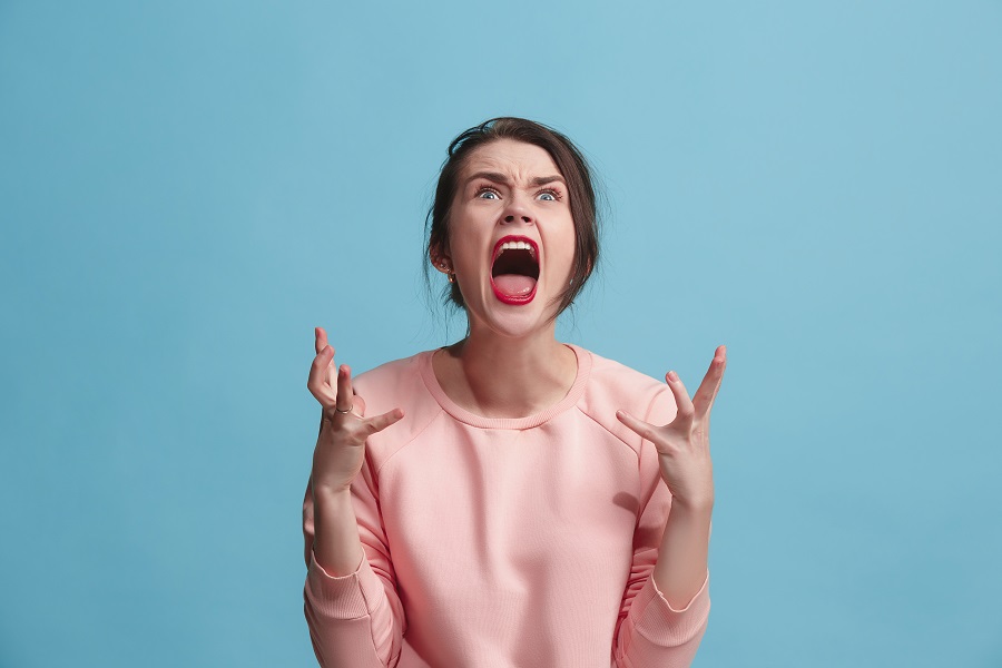 woman screaming - things to avoid when trying to boost your progesterone - Diagnost